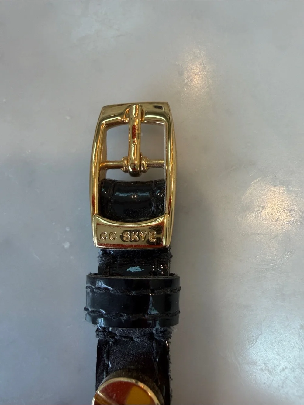 CC Skye Black Leather Bracelet with Gold Disc Studs